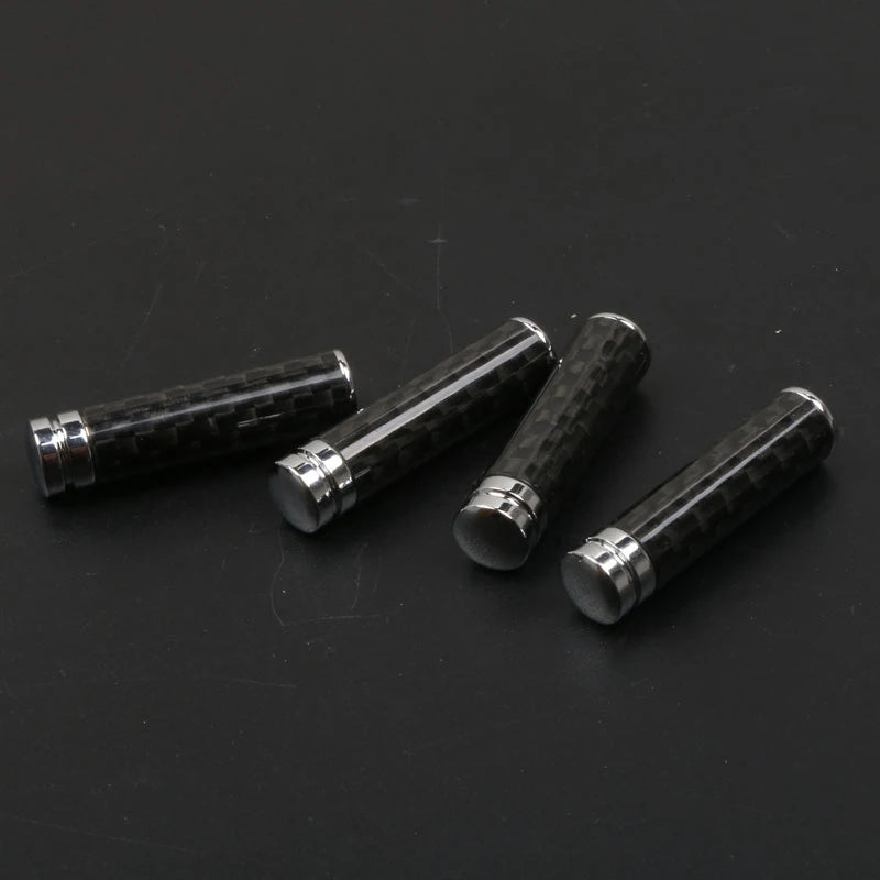 ot de 4 boutons de verrouillage de porte aspect carbone sur fond carbone