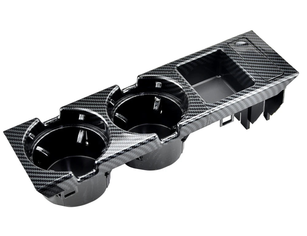 Boîte de rangement de console centrale avec porte-gobelet double finition carbone pour BMW Série 3 E46 présentée seule sur fond blanc