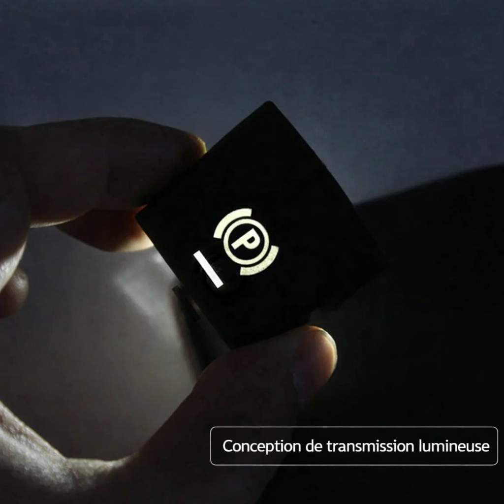 Bouton de frein à main BMW avec éclairage lumineux visible dans l’obscurité