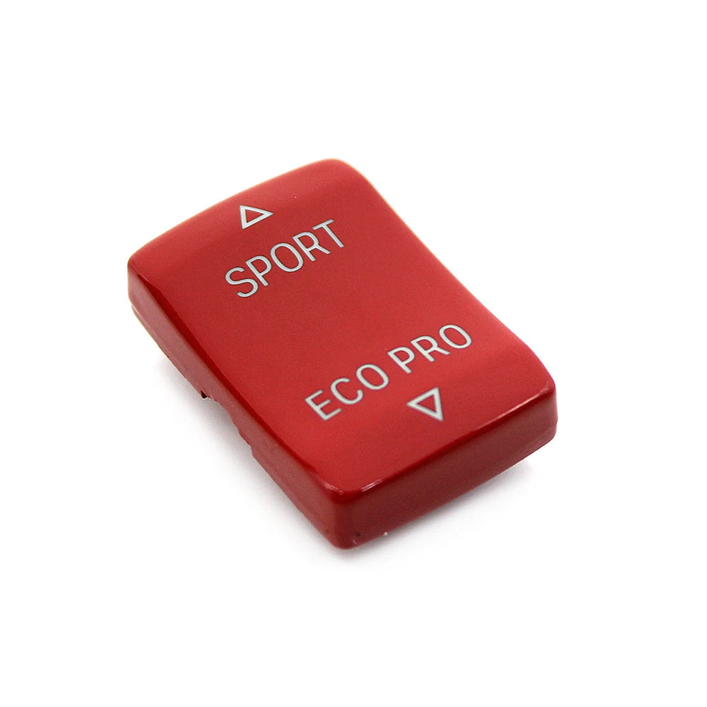 Bouton BMW rouge Sport et Eco Pro présenté seul sur fond blanc
