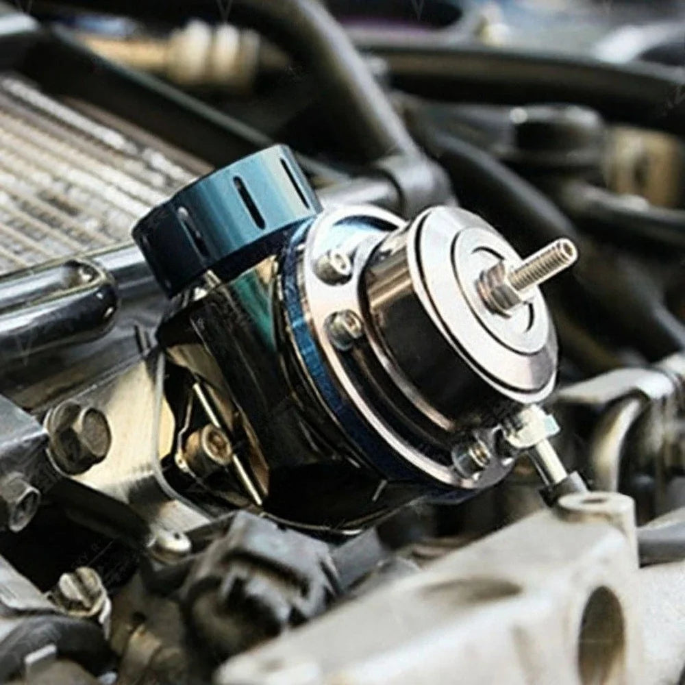 Dump valve type Greddy FV installée dans un compartiment moteur turbo