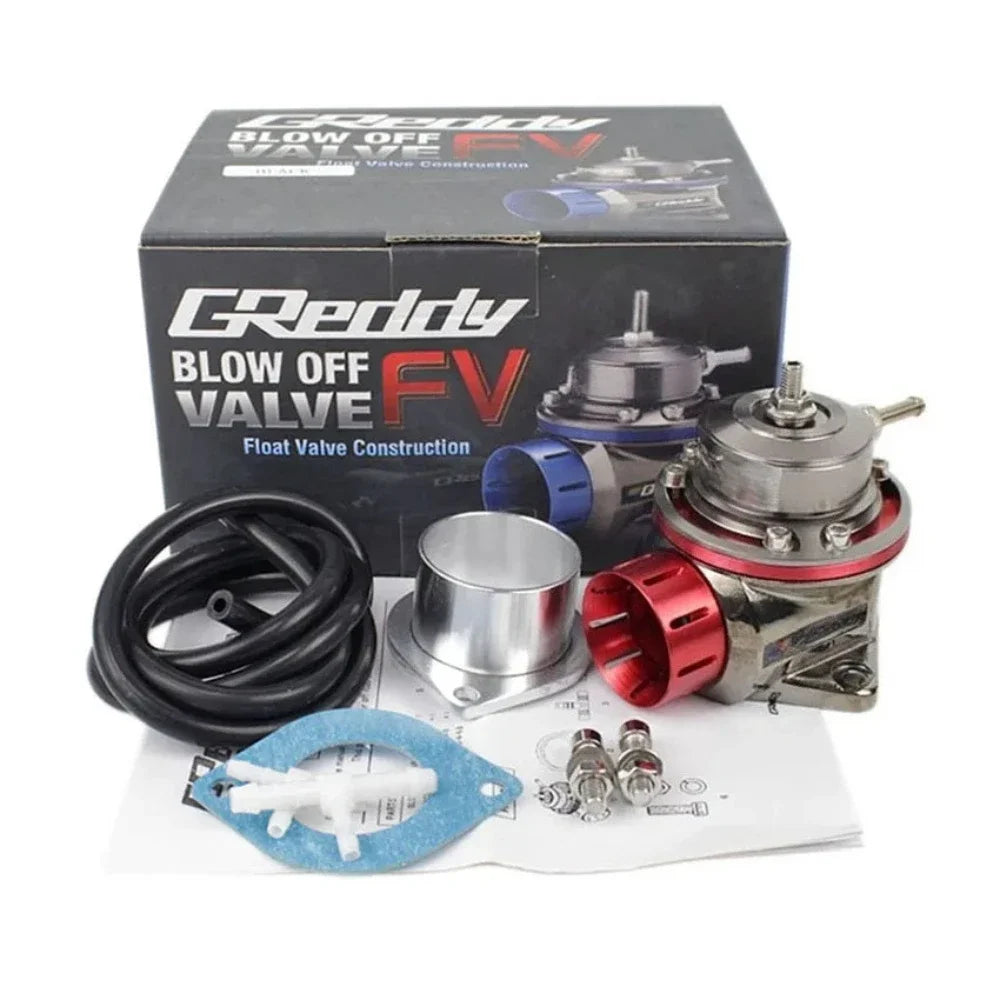 Présentation produit de la dump valve type Greddy FV avec boîte et accessoires