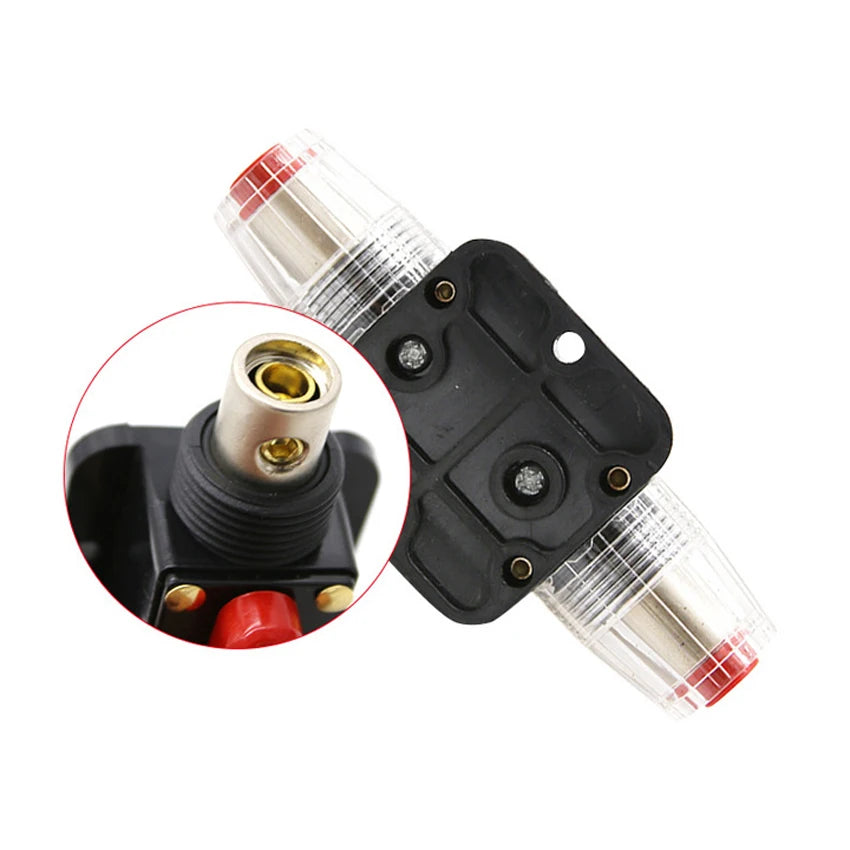 Détail des bornes et du raccordement du fusible disjoncteur réarmable 12V