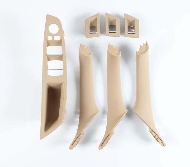Kit de poignées intérieures BMW F10 F11 F18 en finition beige présenté en 7 pièces