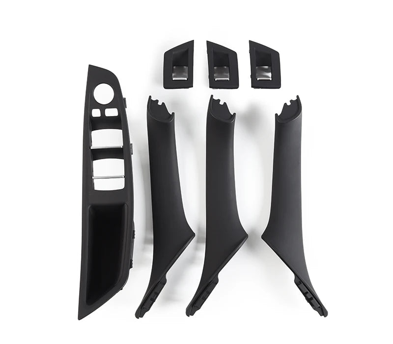 Kit de poignées intérieures BMW F10 F11 F18 en finition noire présenté en 7 pièces