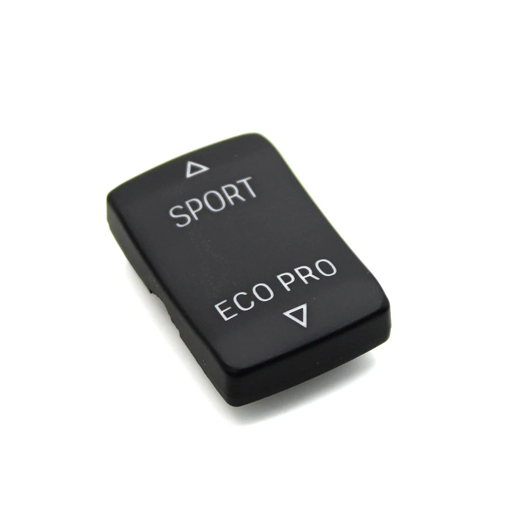 Bouton BMW noir Sport et Eco Pro présenté seul sur fond blanc