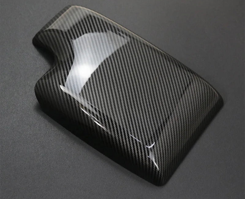 Vue de profil du cache d’accoudoir de console centrale en carbone pour BMW Série 3 E46